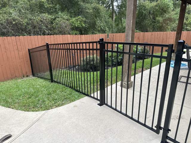 Black metal fence and gate