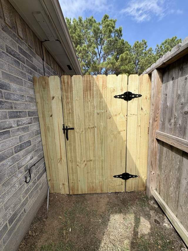 Wood gate built by Edel Contracting