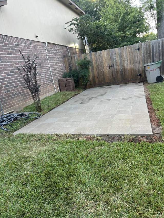 Paver pad by a gate